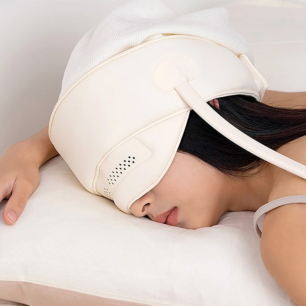 Heated eye massager